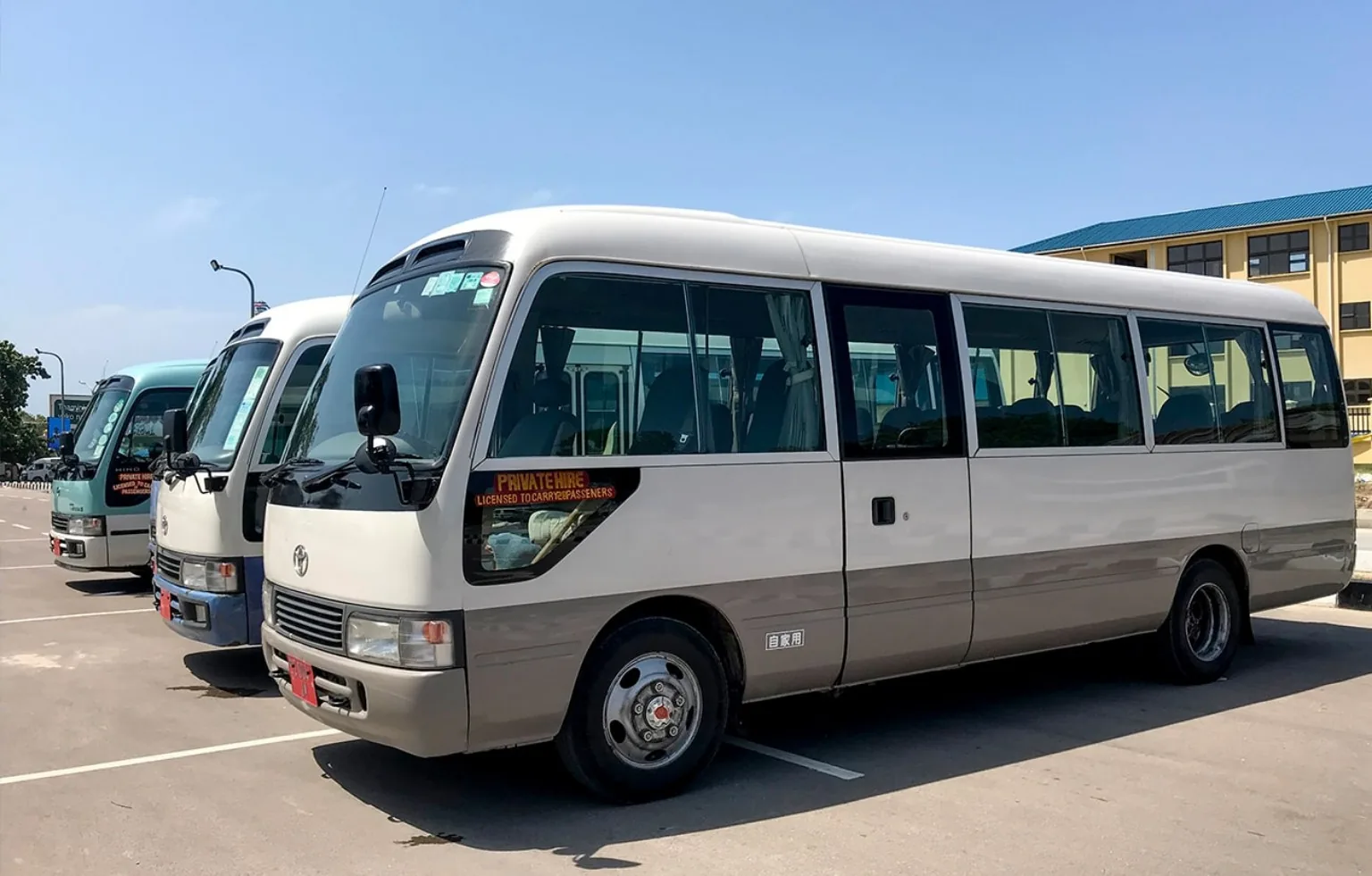 Toyota Coaster private transfer vehicle